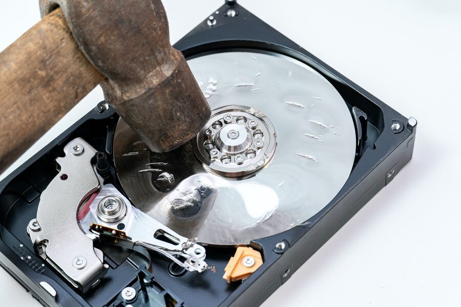 destruction-deleting-data-information-hard-disk-drive-with-hammer_157402-3264